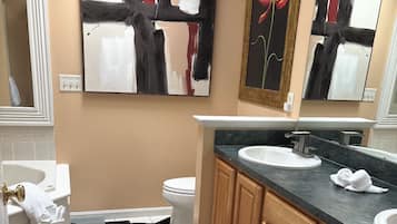 Shower, jetted bath, hair dryer, towels
