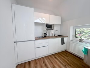 Coffee/tea maker, fridge, microwave, oven - City-Loft Lingen Apartment 1 in the heart of Lingen (Lingen)