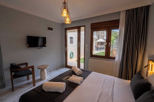 Exclusive Room, Garden View | In-room safe, desk, laptop workspace, iron/ironing board