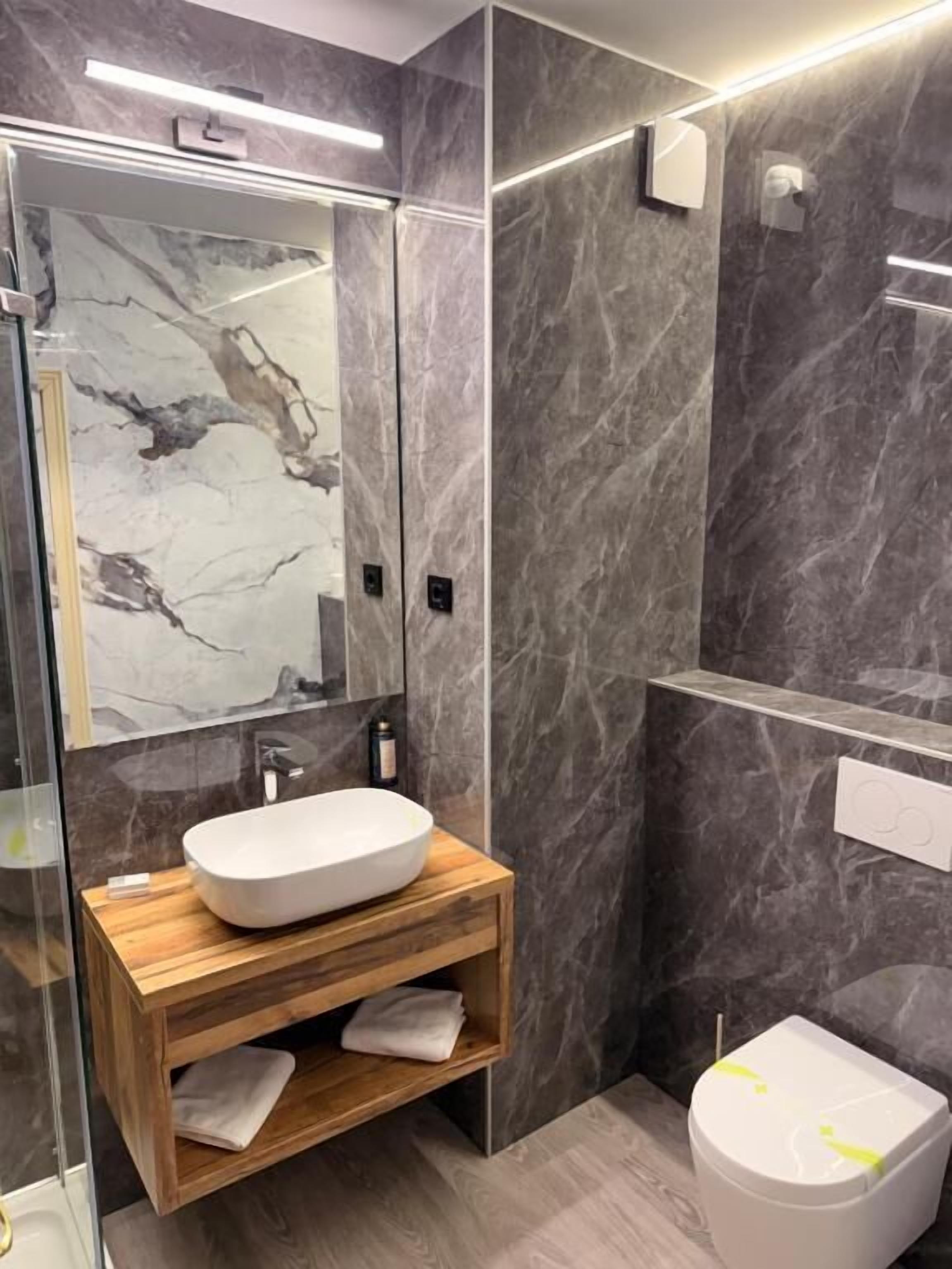 Standard Double Room, Courtyard View | Bathroom | Shower, free toiletries, hair dryer, slippers