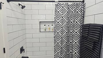 Hair dryer, towels, soap, toilet paper