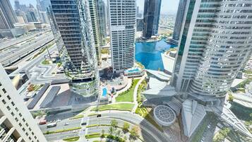 Luxury Apartment, Lake View | In-room safe, blackout drapes, iron/ironing board, free WiFi