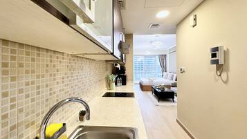 Luxury Apartment, Lake View | In-room safe, blackout drapes, iron/ironing board, free WiFi