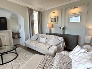 TV, fireplace, offices - Seafront Family home with Ground floor bedroom (Rhos on Sea)