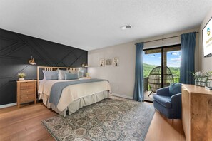 Tabla de planchar con plancha, cuna de viaje, wifi y ropa de cama 