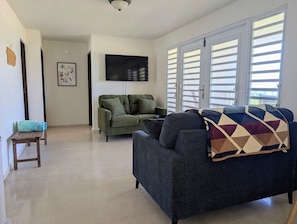 Living Room - Beachfront Luquillo House | Balcony & Kitchen (Luquillo)