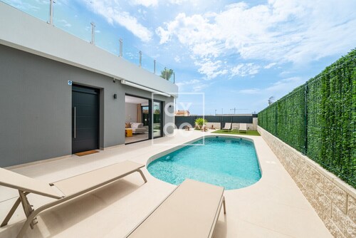 Villa Sol & Senses - Private heated pool, design villa at Serena Golf - by OYOOSTAYS