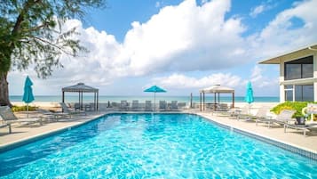 Outdoor pool, open 6:00 AM to 10:00 PM, pool umbrellas, pool loungers