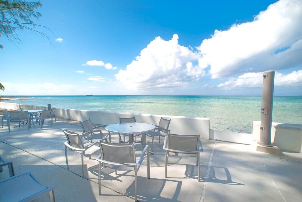 Outdoor pool, open 6:00 AM to 10:00 PM, pool umbrellas, pool loungers