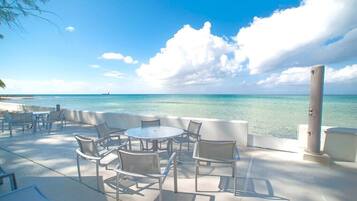 Outdoor pool, open 6:00 AM to 10:00 PM, pool umbrellas, pool loungers