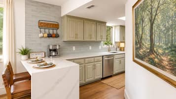 Coffee/tea maker, fridge, microwave, oven