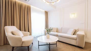 Deluxe Apartment, Balcony, Sea View | Living area