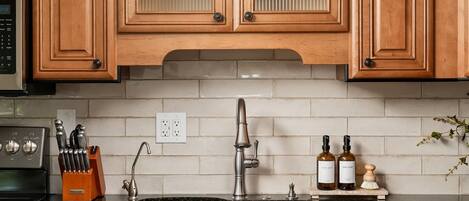 Newly renovated kitchen featuring modern finishes, updated appliances, and everything you need to cook and gather comfortably during your stay.