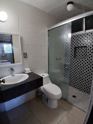 Family Room | Bathroom | Shower, free toiletries, towels, soap