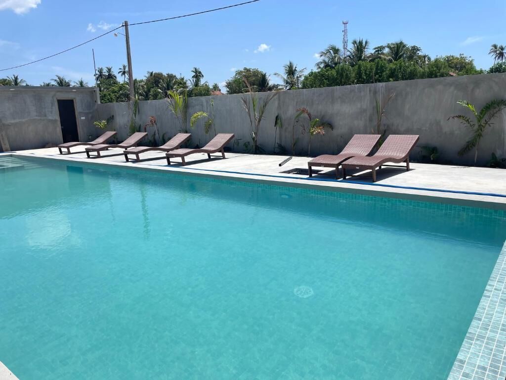 Chambre Deluxe double, balcon, vue sur le jardin | Piscine | Piscine extérieure