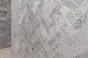 A herringbone-patterned marble wall. - Walker`s Paradise near Wash Park, Free Parking (Cincinnati)