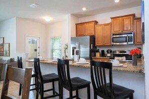 Fridge, microwave, oven, stovetop - Resort Townhouse 5BR - Private Pool - Storey Lake (Kissimmee)