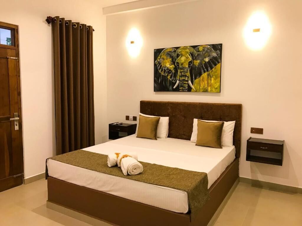 Kamar Double Deluks, balkon, pemandangan kebun | Ruang kerja ramah laptop dan Wi-Fi gratis