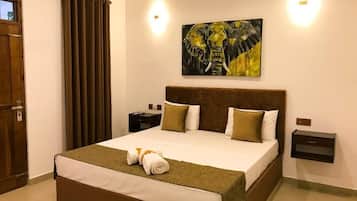 Kamar Double Deluks, balkon, pemandangan kebun | Ruang kerja ramah laptop dan Wi-Fi gratis
