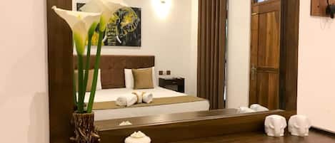 Deluxe Double Room, Balcony, Garden View | Laptop workspace, free WiFi