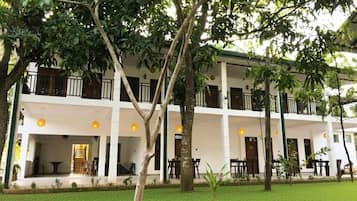 Kamar Double Deluks, balkon, pemandangan kebun | Eksterior