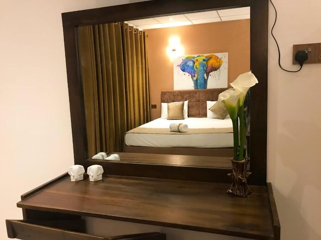 Deluxe Double Room, Balcony, Garden View | Laptop workspace, free WiFi