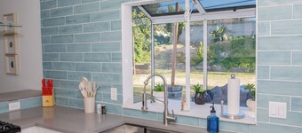 Modern 4BR Retreat With Yard, Garage With EV Outdoor Plug for Electric Cars!