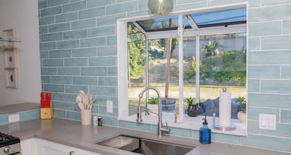 Modern 4BR Retreat With Yard, Garage With EV Outdoor Plug for Electric Cars!