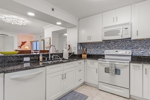 Fridge, microwave, oven, stovetop - Coastal Charm at Seascape - 1 Bedroom Oceanview Condo (New Smyrna Beach)