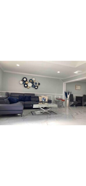 Living area - New Beautiful 3-bedroom vacation home with AC & Extra space in Mastic NY (Mastic)
