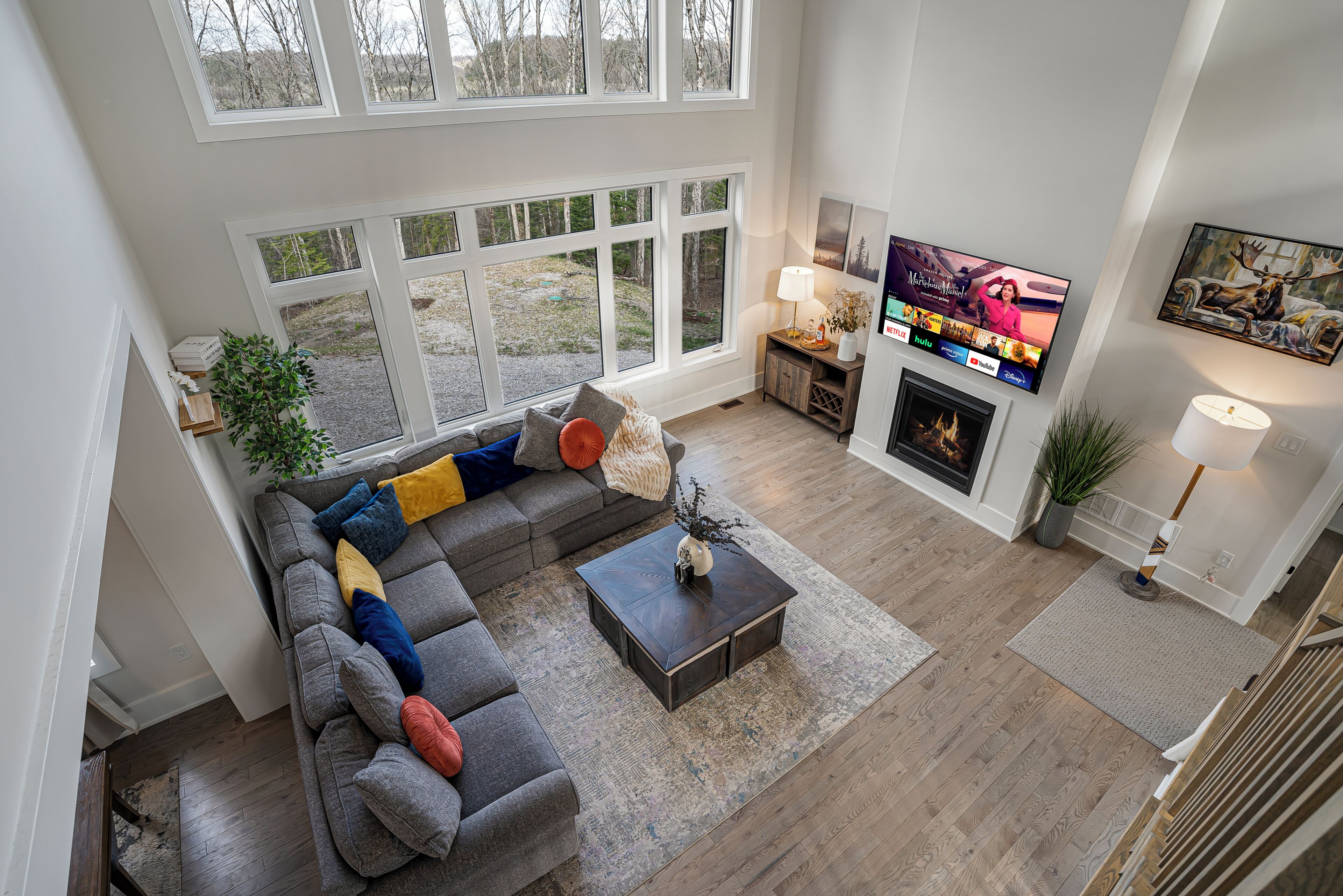 Smart TV, fireplace, table football, books