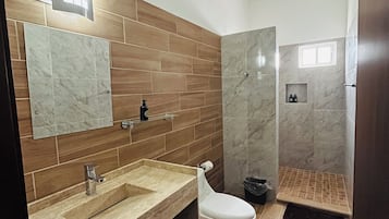 Family Apartment, Non Smoking | Bathroom | Shower, towels, soap, shampoo