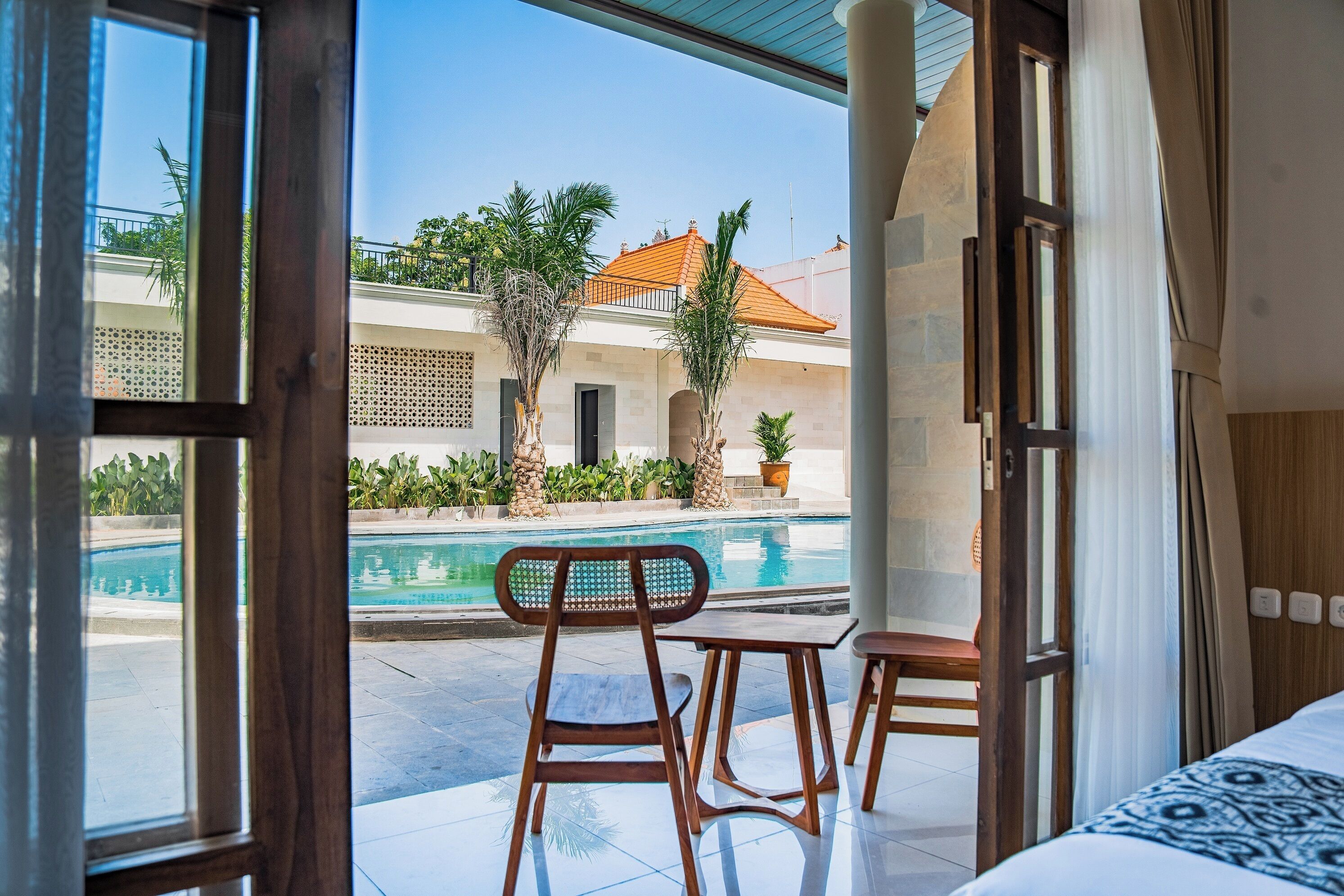 Habitación Deluxe doble, terraza, vistas a la piscina | Vistas al jardín