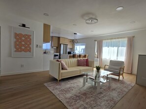 Living area - Coral Cove. Walk to Beach & Downtown! New Oceanside 2BD Apartment (Oceanside)