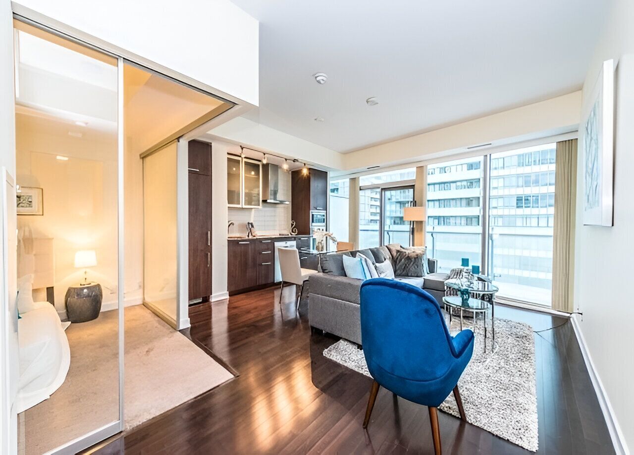 Grand Suite, 3 Bedrooms | Living area | 50-inch flat-screen TV with digital channels