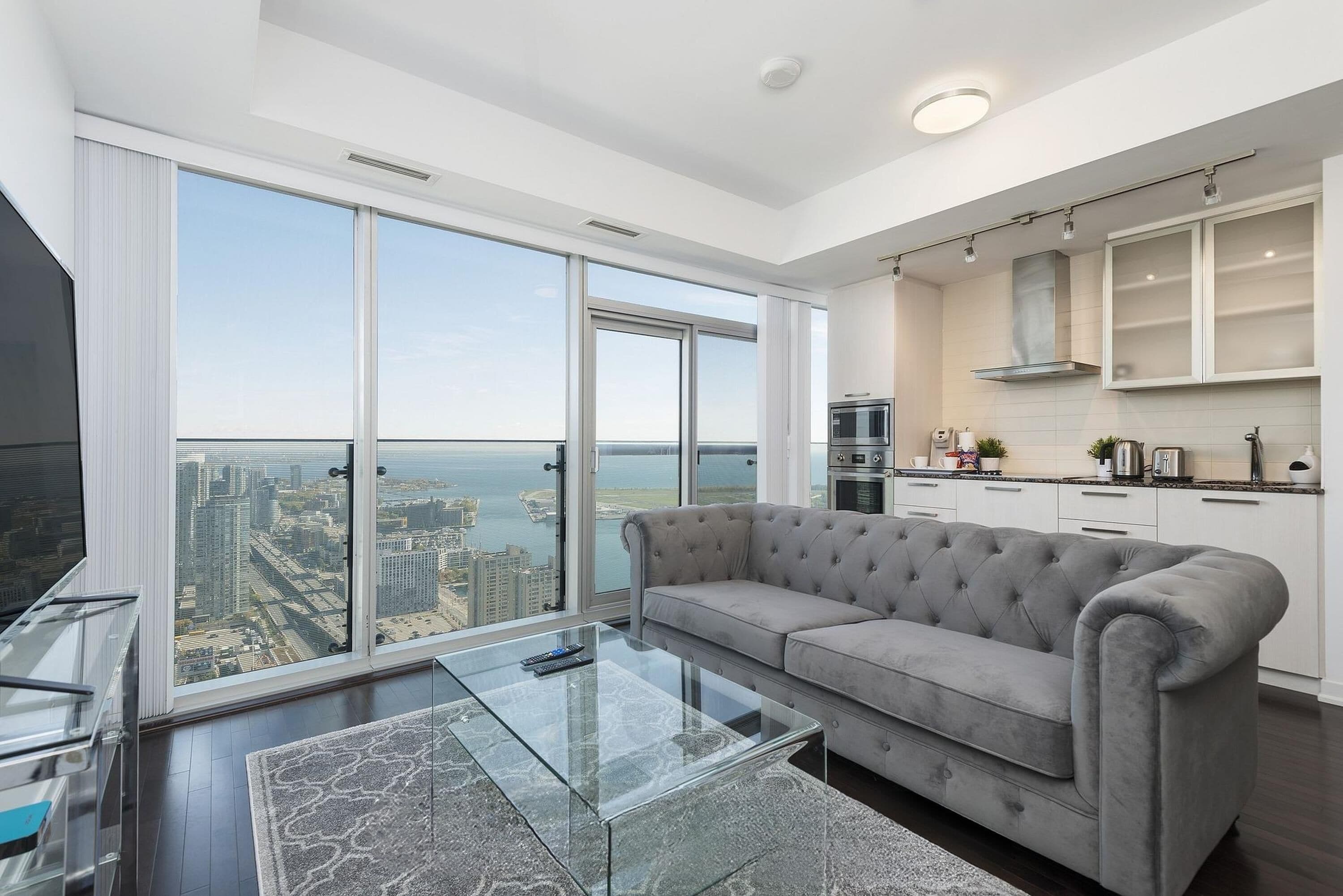 Exclusive Suite, 1 Bedroom, Private Bathroom | Living area | 50-inch flat-screen TV with digital channels