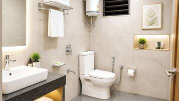 Shower, rainfall showerhead, slippers, towels