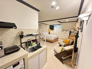 Deluxe Studio, 1 Queen Bed, Non Smoking, Kitchenette | Blackout curtains, soundproofing, iron/ironing board, free WiFi - CozyNook Boutique Apartments (Da Lat)