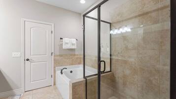 Shower, hair dryer, towels, shampoo