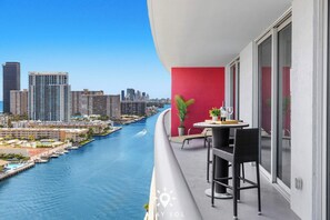 Outdoor dining - Sunny Comfort with Pool and Balcony Space (Hallandale Beach)