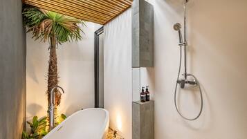 Shower, jetted tub, hair dryer, bidet