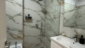 Basic Apartment, 1 Bedroom, Balcony | Bathroom | Shower, free toiletries, hair dryer, slippers