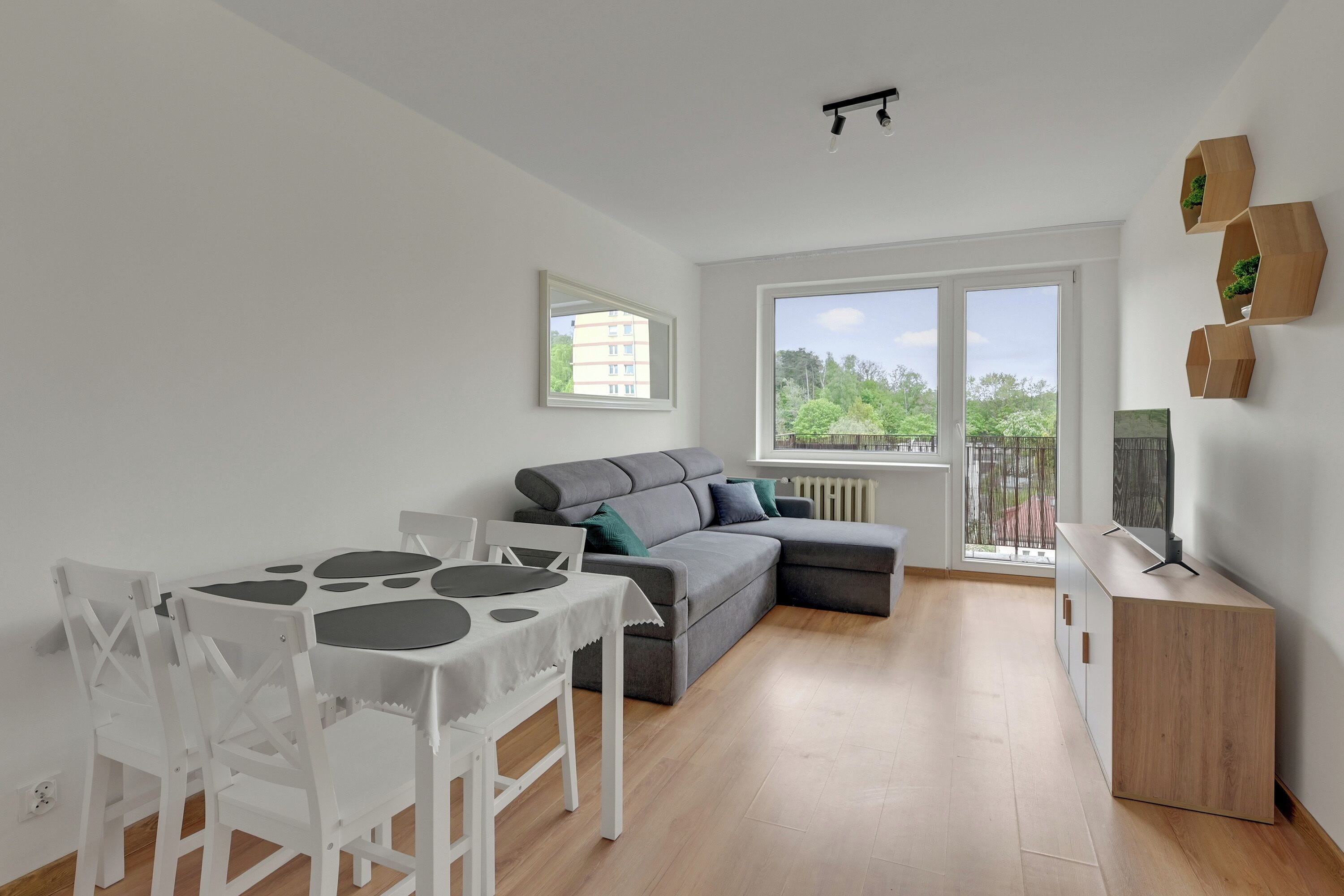 Deluxe-huoneisto, merinäköala | Oleskelualue