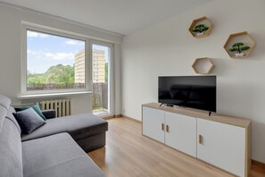 Apartamento luxo, vista para o mar | Área de estar