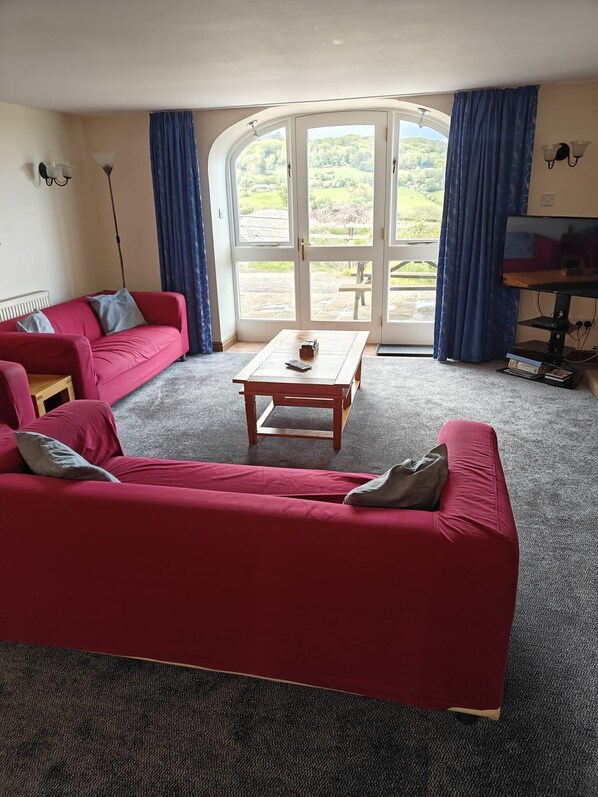 Living area - 4 Bedroom Cottage, Sleeps 8, Patio with stunning views. (Robin Hood's Bay)