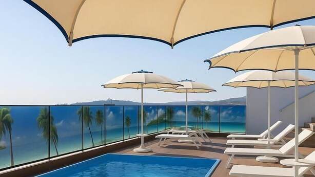 A rooftop pool with clear blue water, surrounded by white lounge chairs and umbrellas, overlooking a tropical beach with palm trees. - Hotel Antalya Beach Durres (Durrës)
