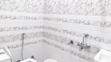 Shower, rainfall showerhead, slippers, towels