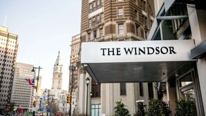 A hotel sign with 'THE WINDSOR' prominently displayed. - Parkway City Stay | Skydeck, Pool + Full Kitchen (Philadelphia)
