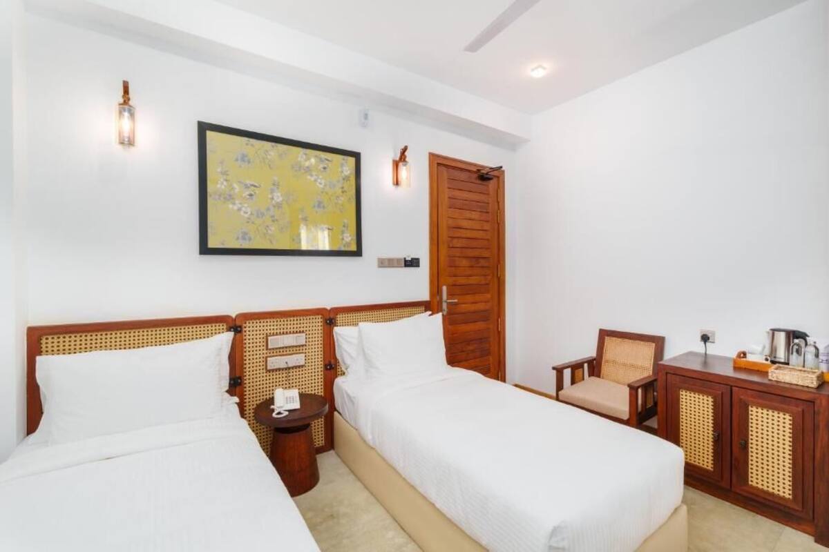 Chambre Double Supérieure, balcon, vue jardin | Coffres-forts dans les chambres, fer et planche à repasser
