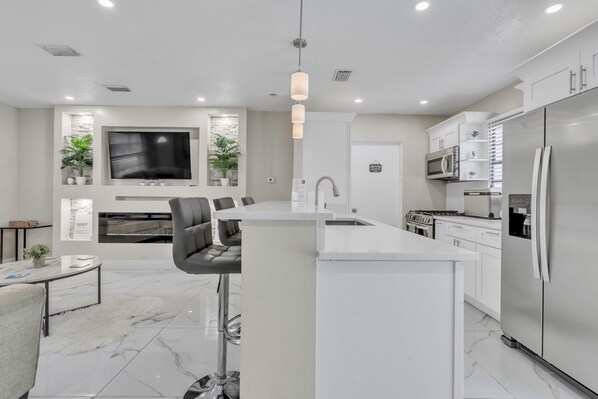 Private kitchen - Spacious Pool Home + Private Suite Near Airport! Sleeps 12! (Tampa)
